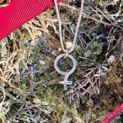 Kvinnotecken - Halsband