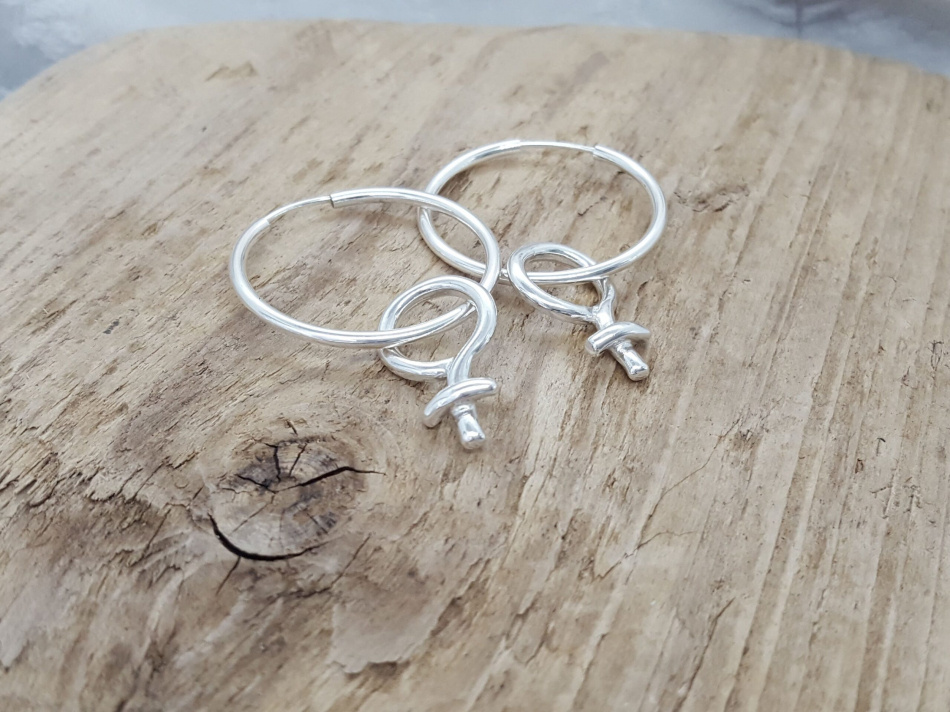 Kvinnosymbol - örringar 2