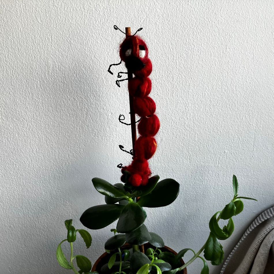 Ulldekoration-röd insekt