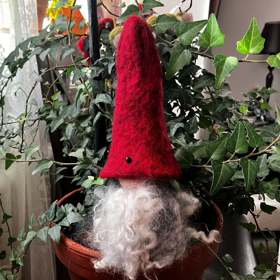 Hustomte sommar och vinter